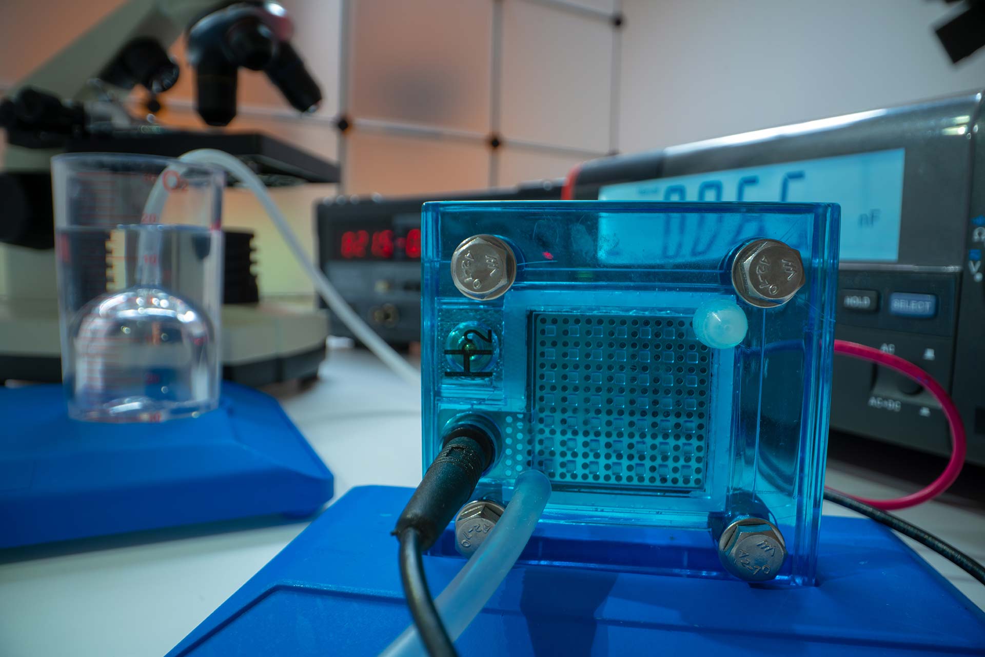 blue hydrogen fuel cell sitting in a desk