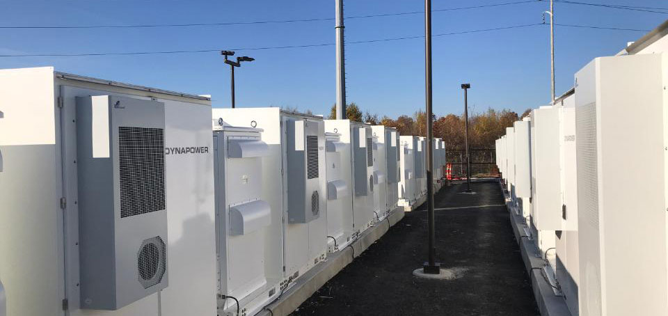 rows of dynapower behind the meter energy storage systems